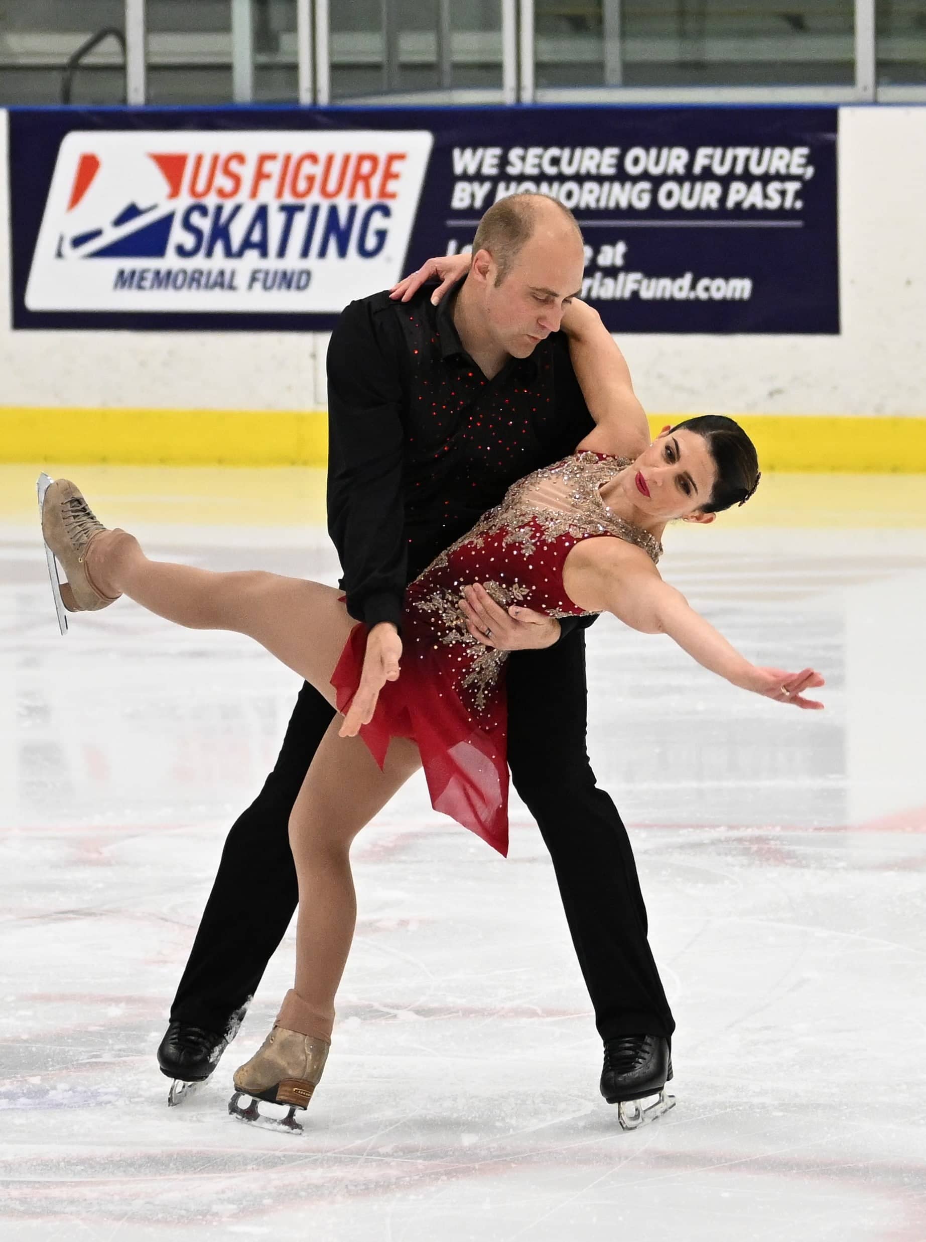 a man dips a woman while competing in master pairs at the 2023 U.S. Adult Championships